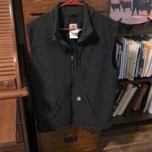 Black Carhartt vest, some pilling but lots of life.